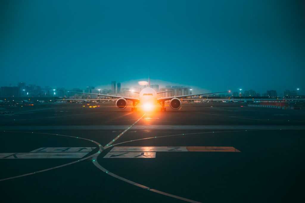 Aircraft Airplane Stand On Runway In Evening Night Time